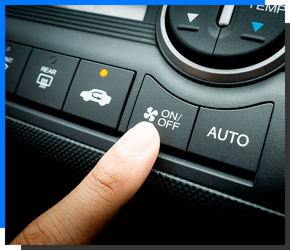 Finger pressing on Power button on off switch of a Car air conditioning and heating system